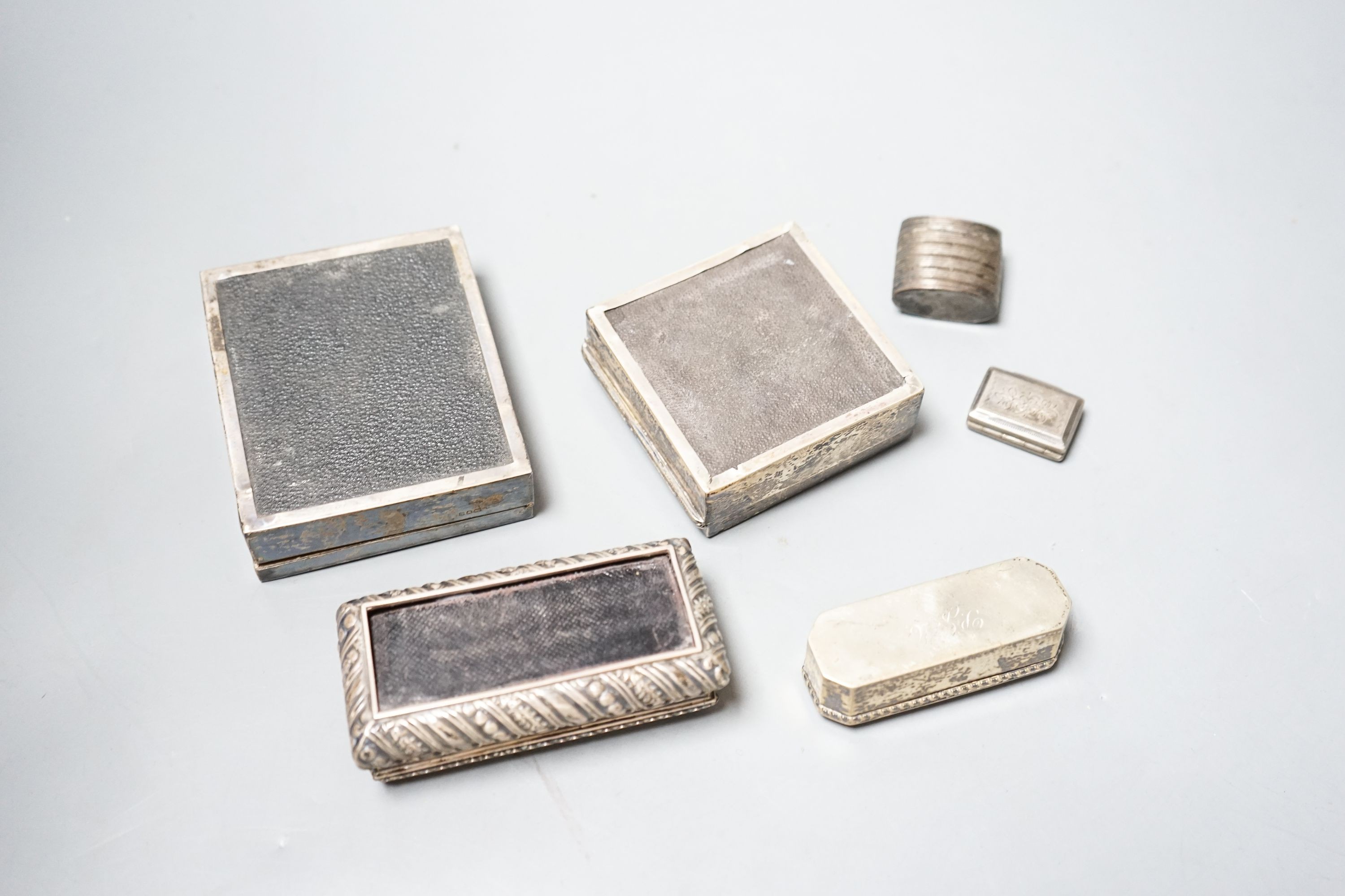 A George IV silver vinaigrette (lacking grille), Birmingham, 1825, 33mm, a Dutch white metal snuff box, and four other silver boxes.